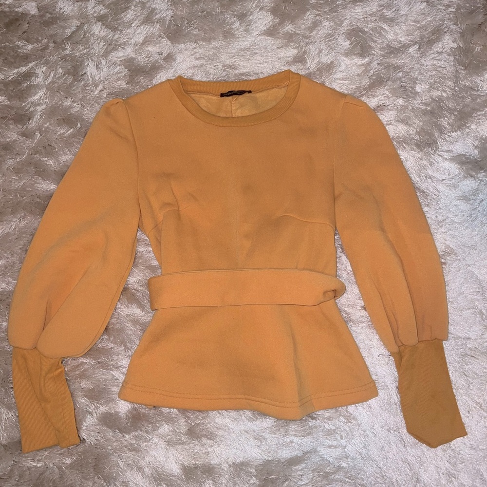 Peplum sweater top